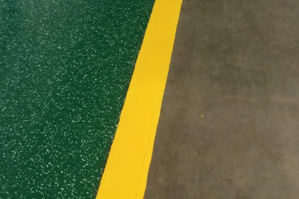 TreadWell with Moisture Blocking Primer, a High Wear Topcoat, and Lane Striping