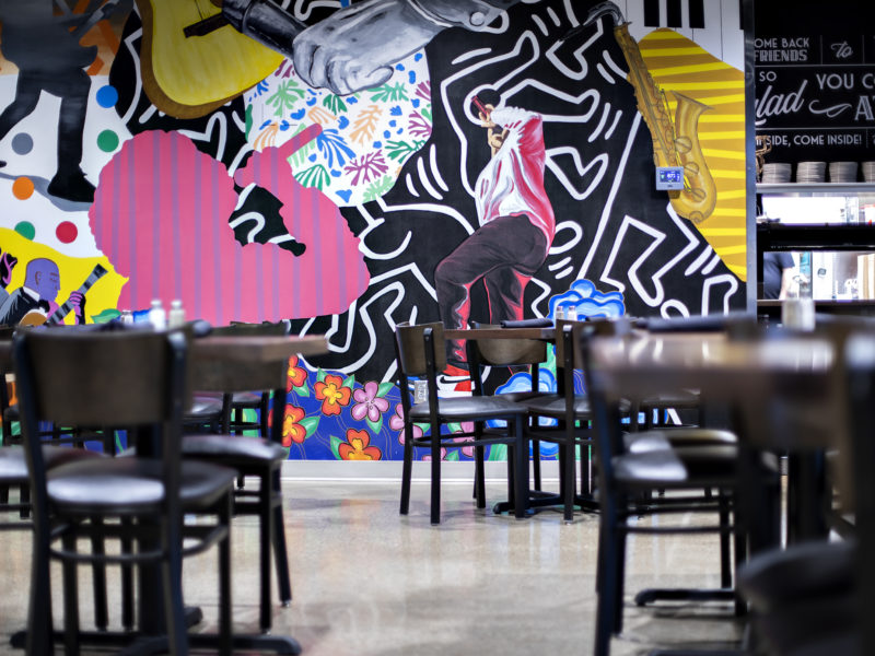 Colorful mural on an accent wall at the ClubRoom at the Clyde